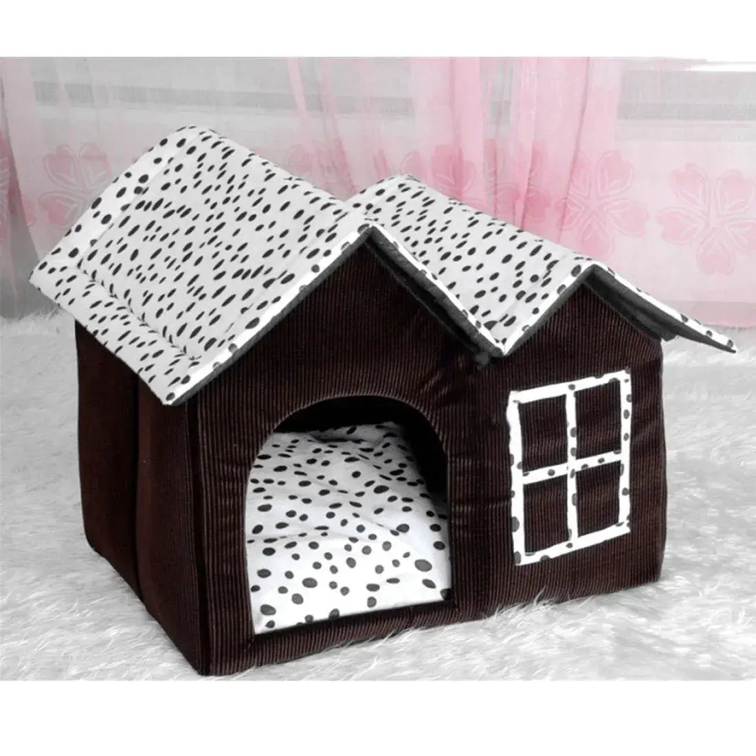 Cozy pet house with a polka dot roof and soft interior, perfect for small dogs and cats to relax in.