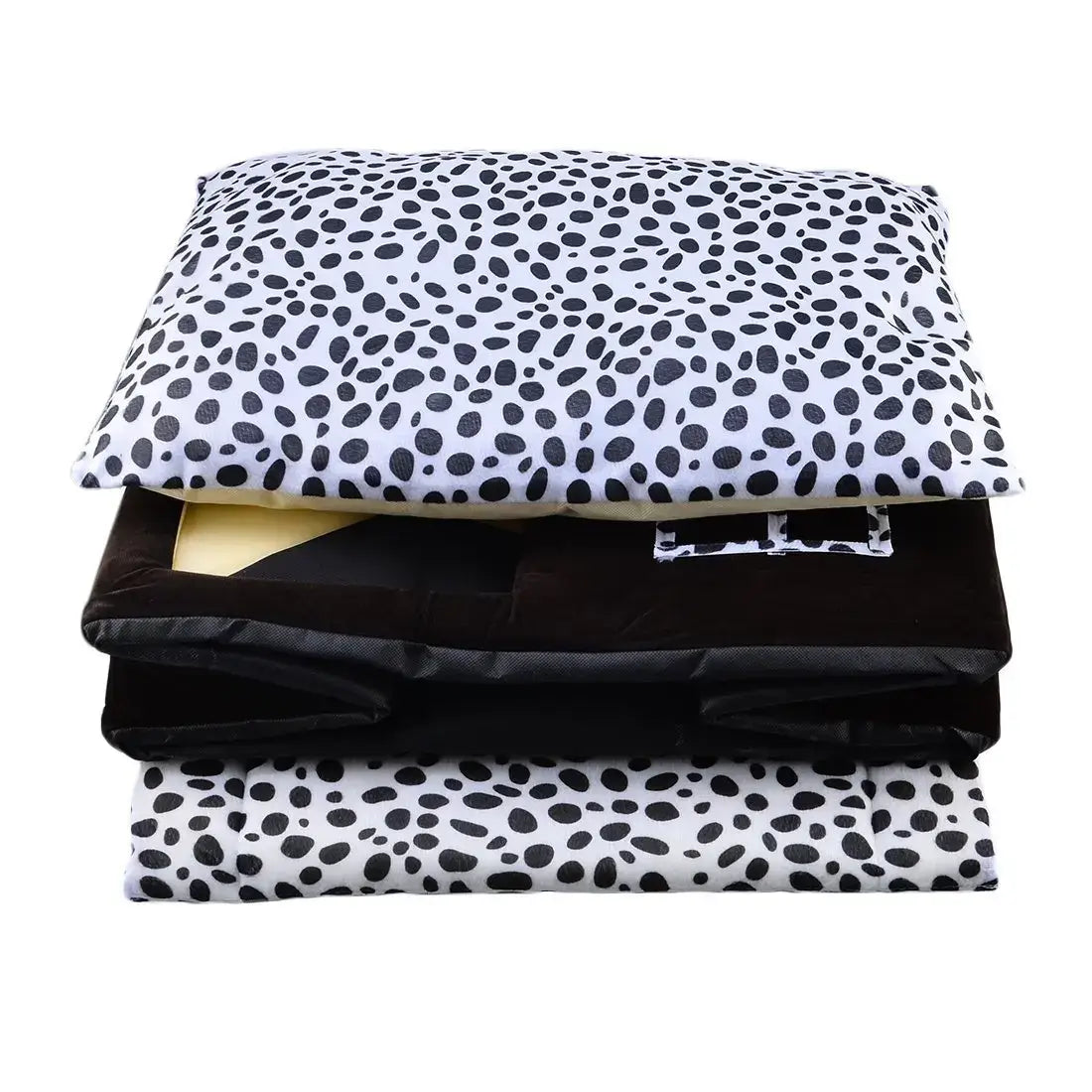 Stylish pet bed with black and white spotted design, featuring removable cushions for dogs and cats.